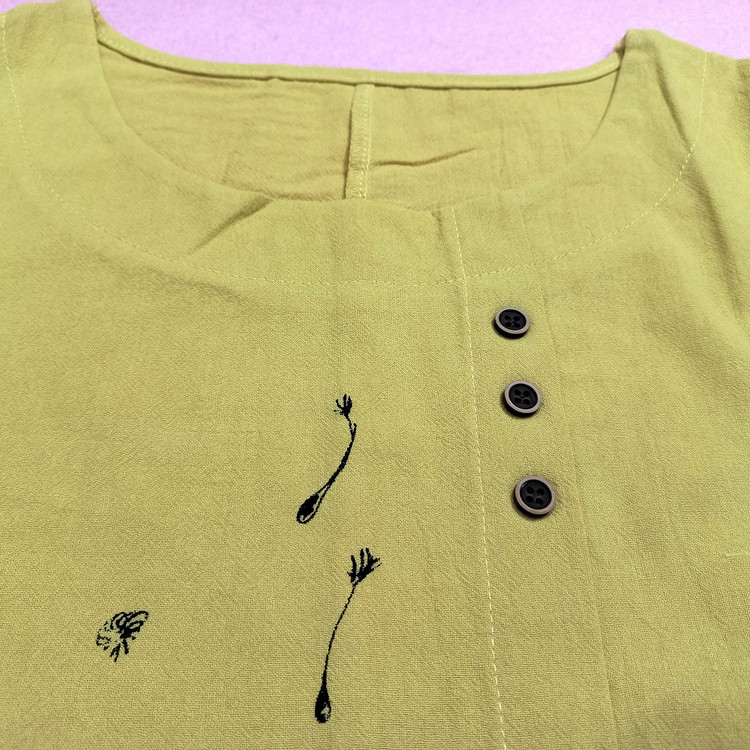 تیشرت آستین کوتاه کنفی قواره دار رنگ زرد